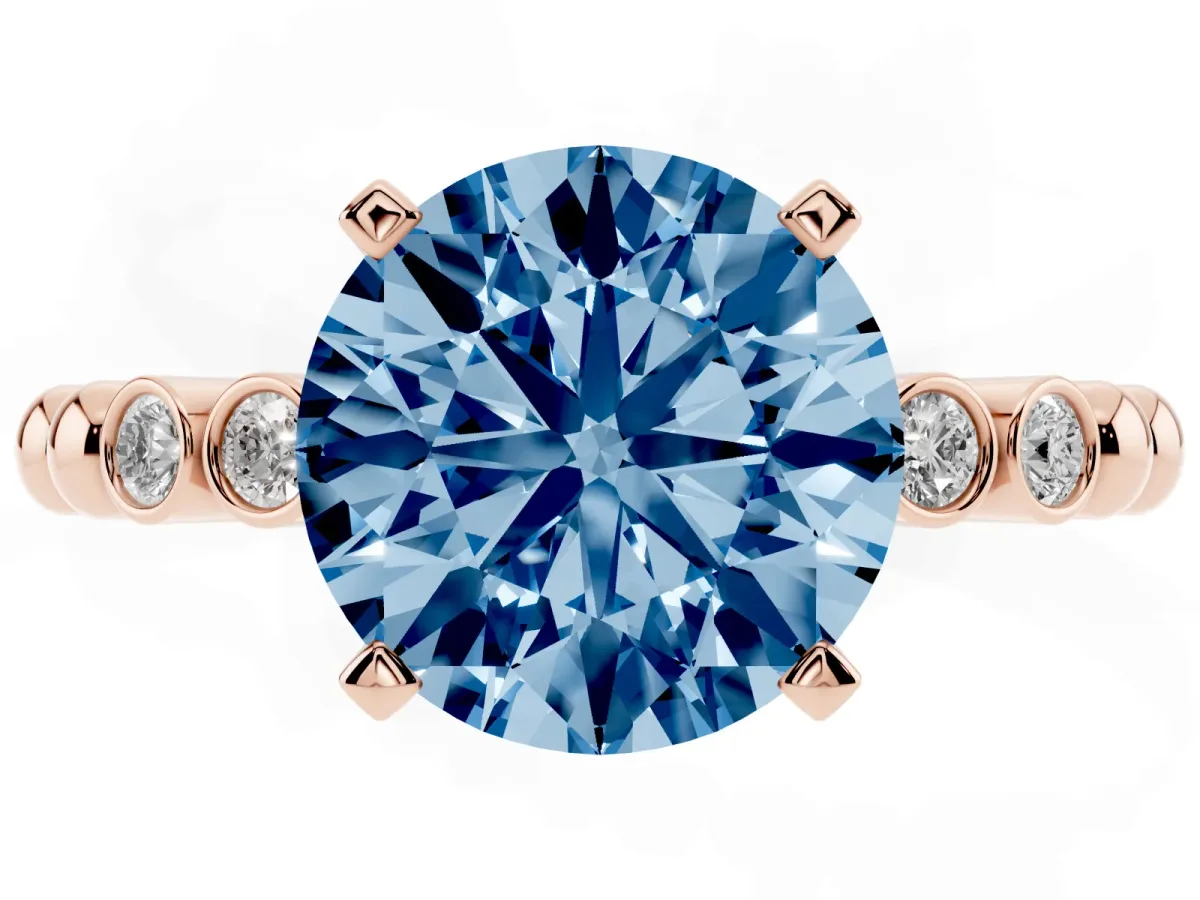 Fancy Blue Round Cut Solitaire Bezel Accent Diamond Engagement Ring with Beaded Band and Four-Prong Setting Rose gold