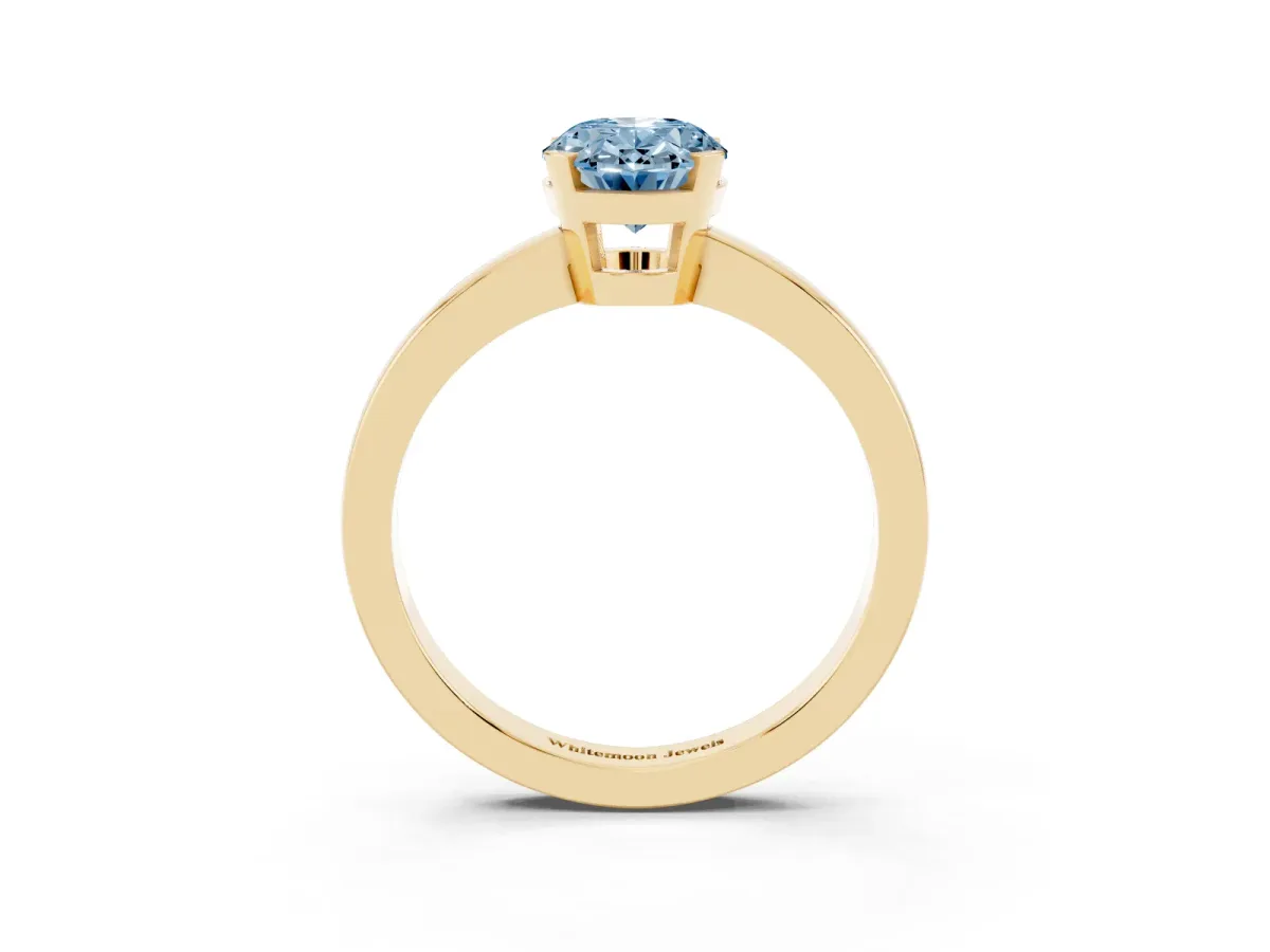 Fancy Blue Oval Cut Cut Solitaire Ring with Four-Prong Setting and Classic Band Yellow gold