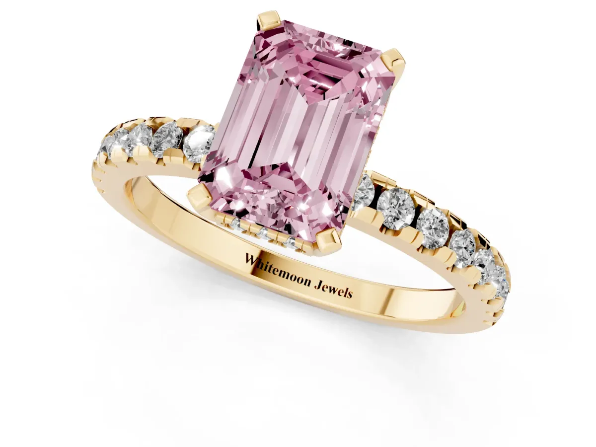Fancy Pink Emerald Cut Diamond Solitaire Ring with Round Pavé Band and Four-Prong Setting Yellow gold