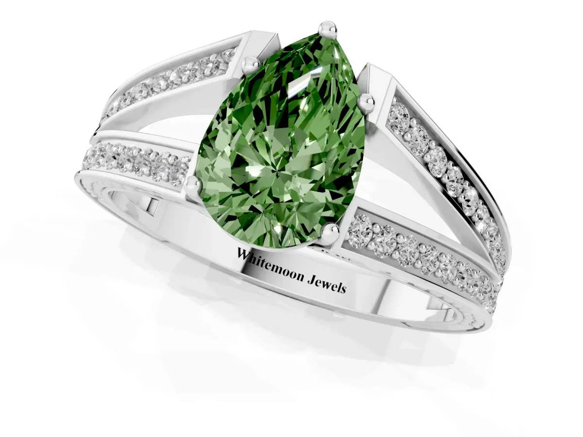 Fancy Green Pear Cut Diamond Split Shank Ring with Pavé Band and Four-Prong Setting Silver