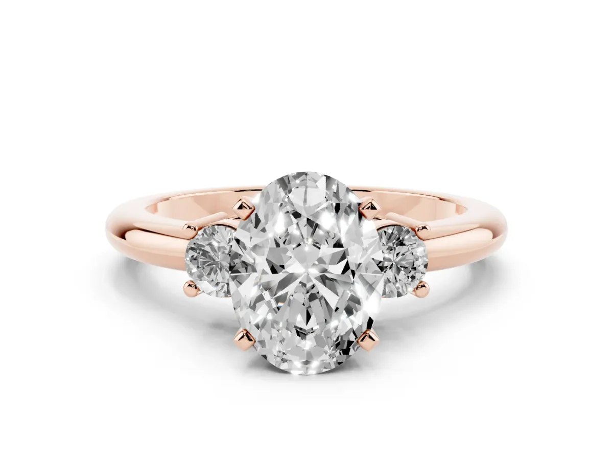 Three-Stone Oval Cut Cut Diamond Solitaire with Prong Setting and Classic Band Rose gold