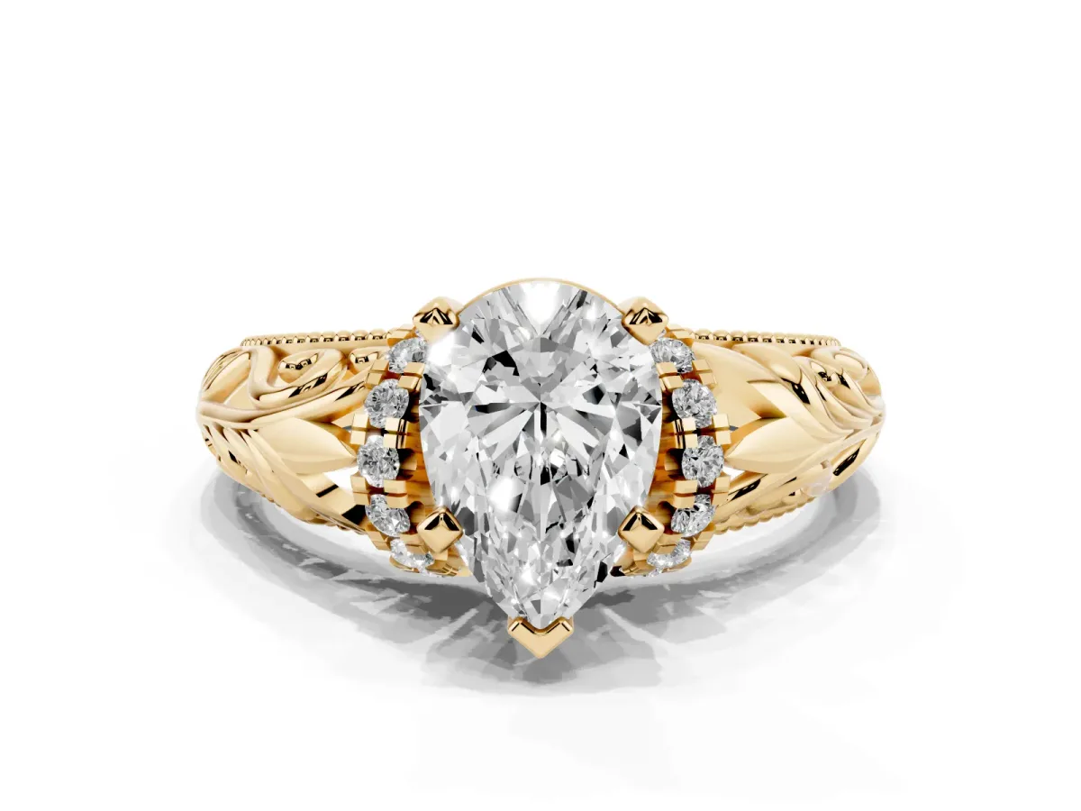 Pear Cut Solitaire Filigree Engagement Ring with Halo and Prong Setting Yellow gold