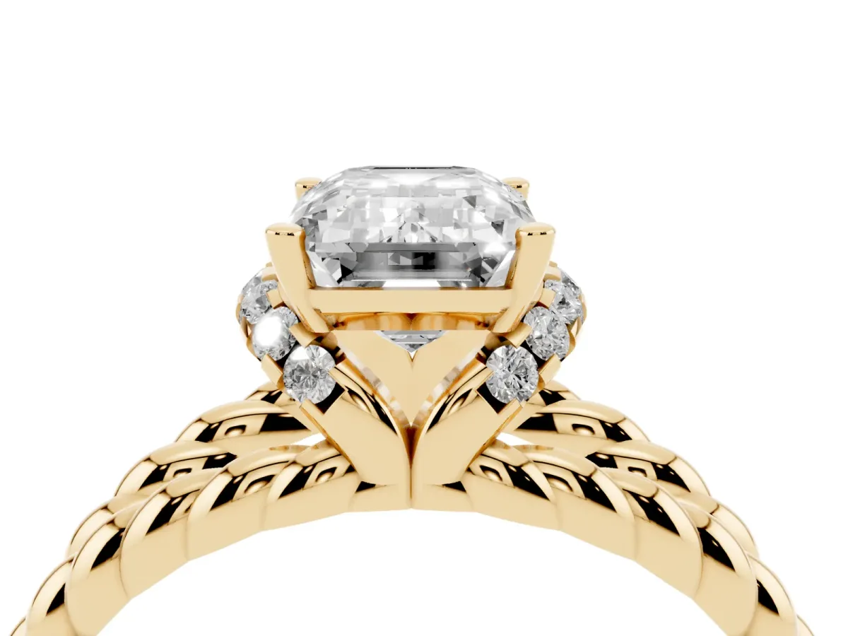 Emerald Cut Halo Twisted Band Four-Prong Ring Yellow gold