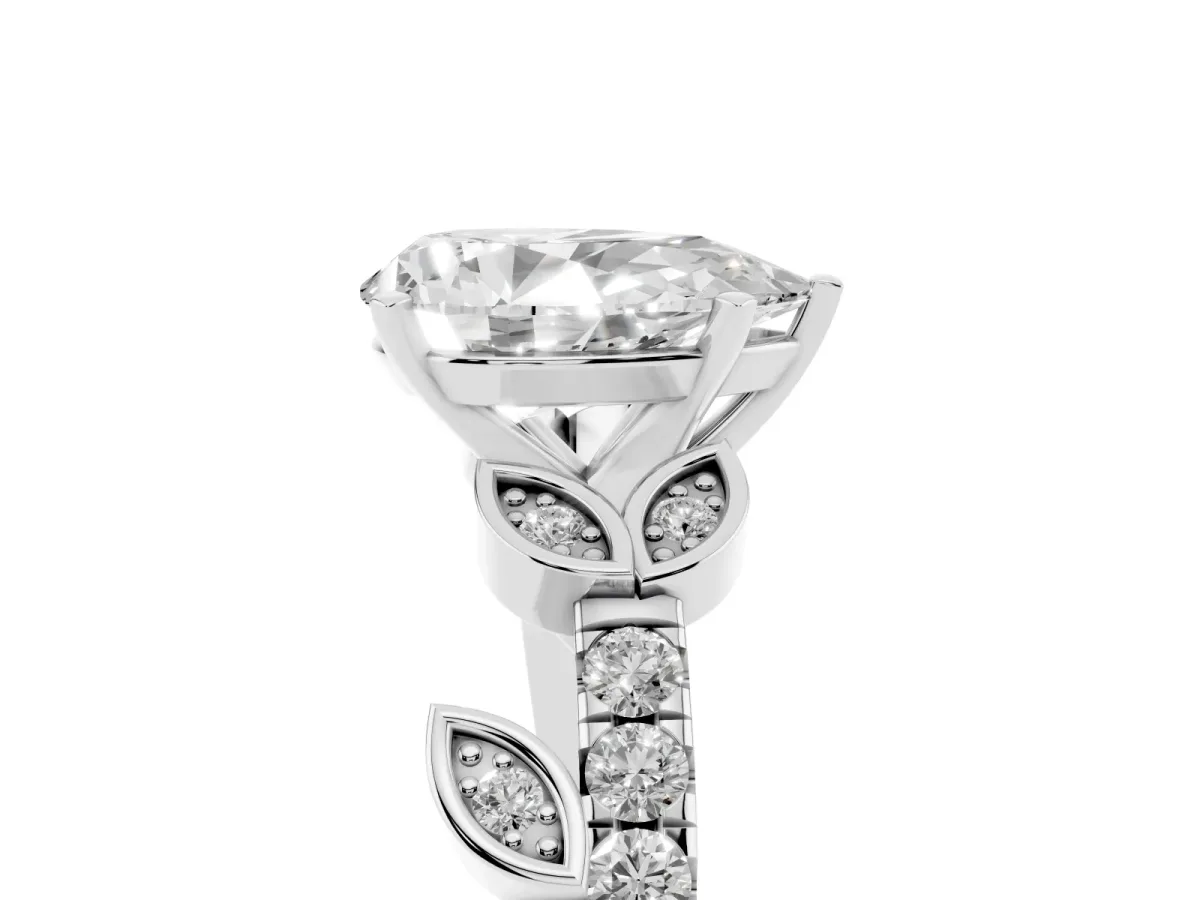 Pear Cut Solitaire Leaf-Inspired Diamond Ring with Pavé Band and Four-Prong Setting Silver