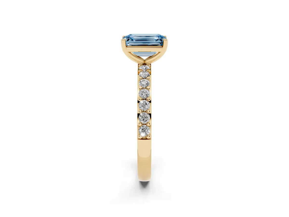 Fancy Blue Emerald Cut Cut Diamond Solitaire with Pave Band and Four-Prong Setting Yellow gold