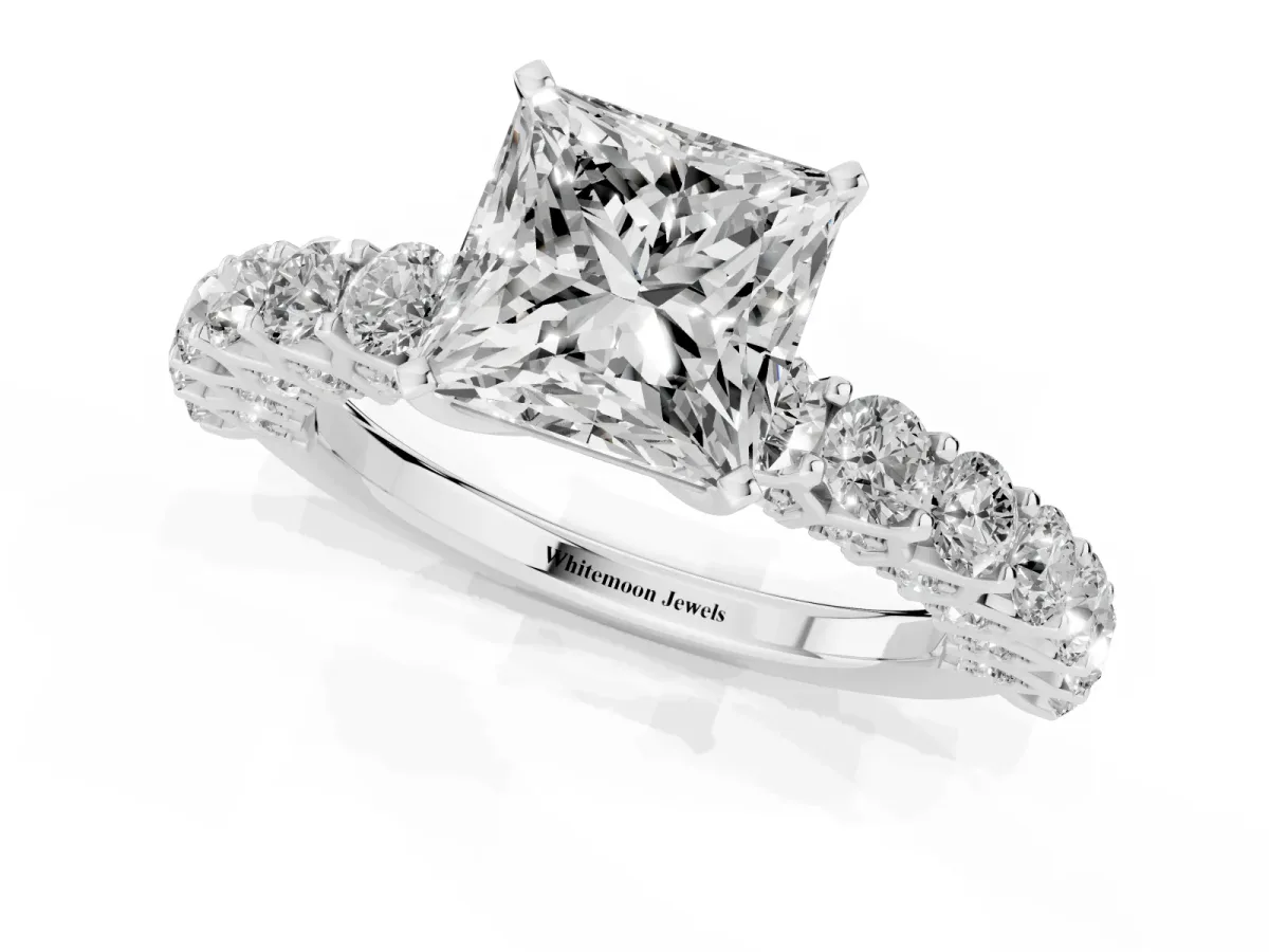 Princess Cut Diamond Solitaire Ring with Shared Prong Pavé Band and Four-Prong Setting Platinum