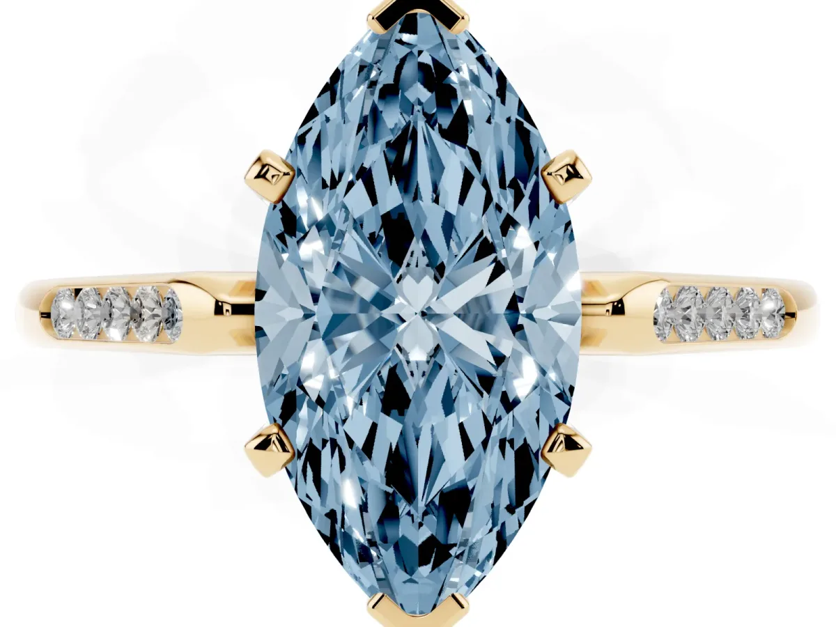 Fancy Blue Marquise Cut Diamond Solitaire Ring with Channel Set Round Band and Prong Setting Yellow gold