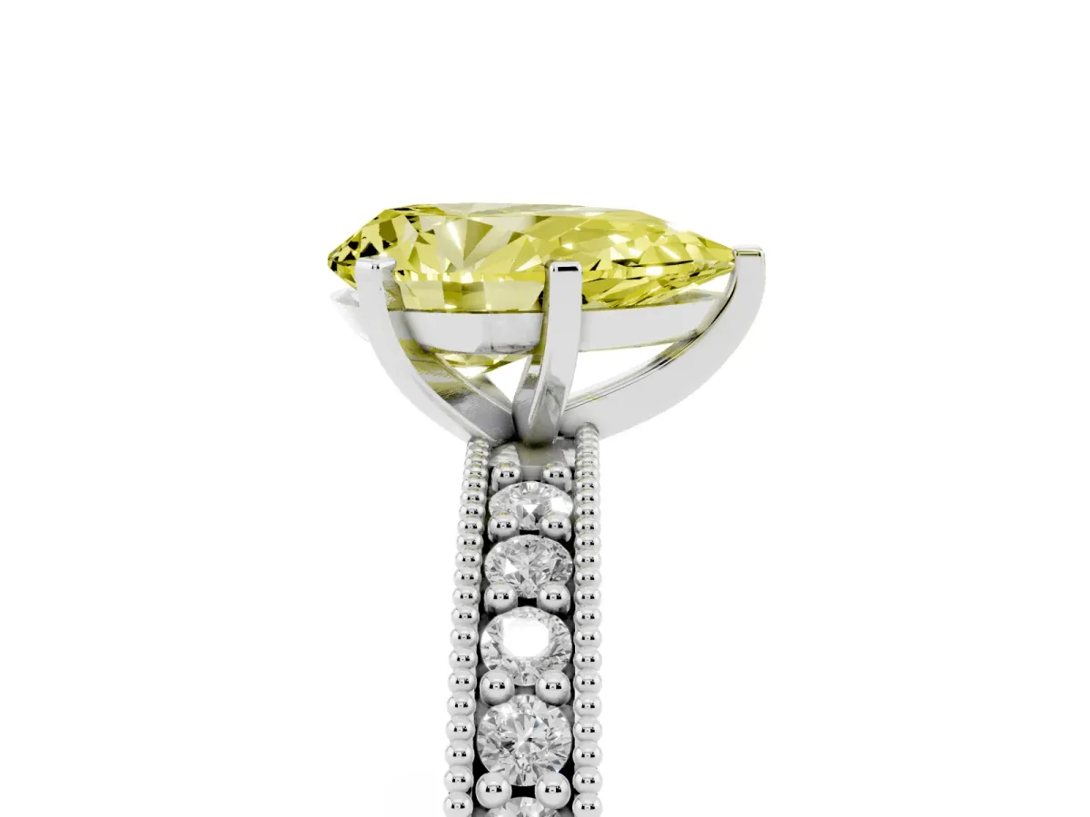 Fancy Yellow Pear Cut Diamond Milgrain Pavé Engagement Ring with Four-Prong Setting Silver