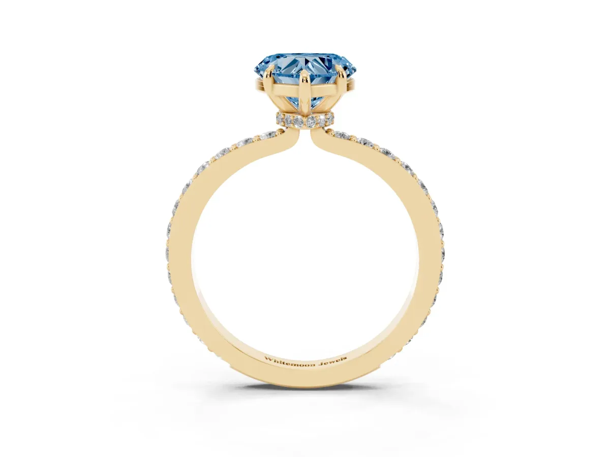 Fancy Blue Heart Cut Diamond Pavé Engagement Ring with Round Accents and Prong Setting Yellow gold
