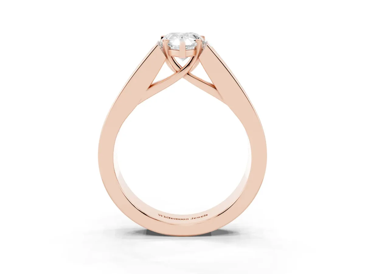 Pear Cut Cut Channel Set Solitaire Ring with Four-Prong Setting Rose gold