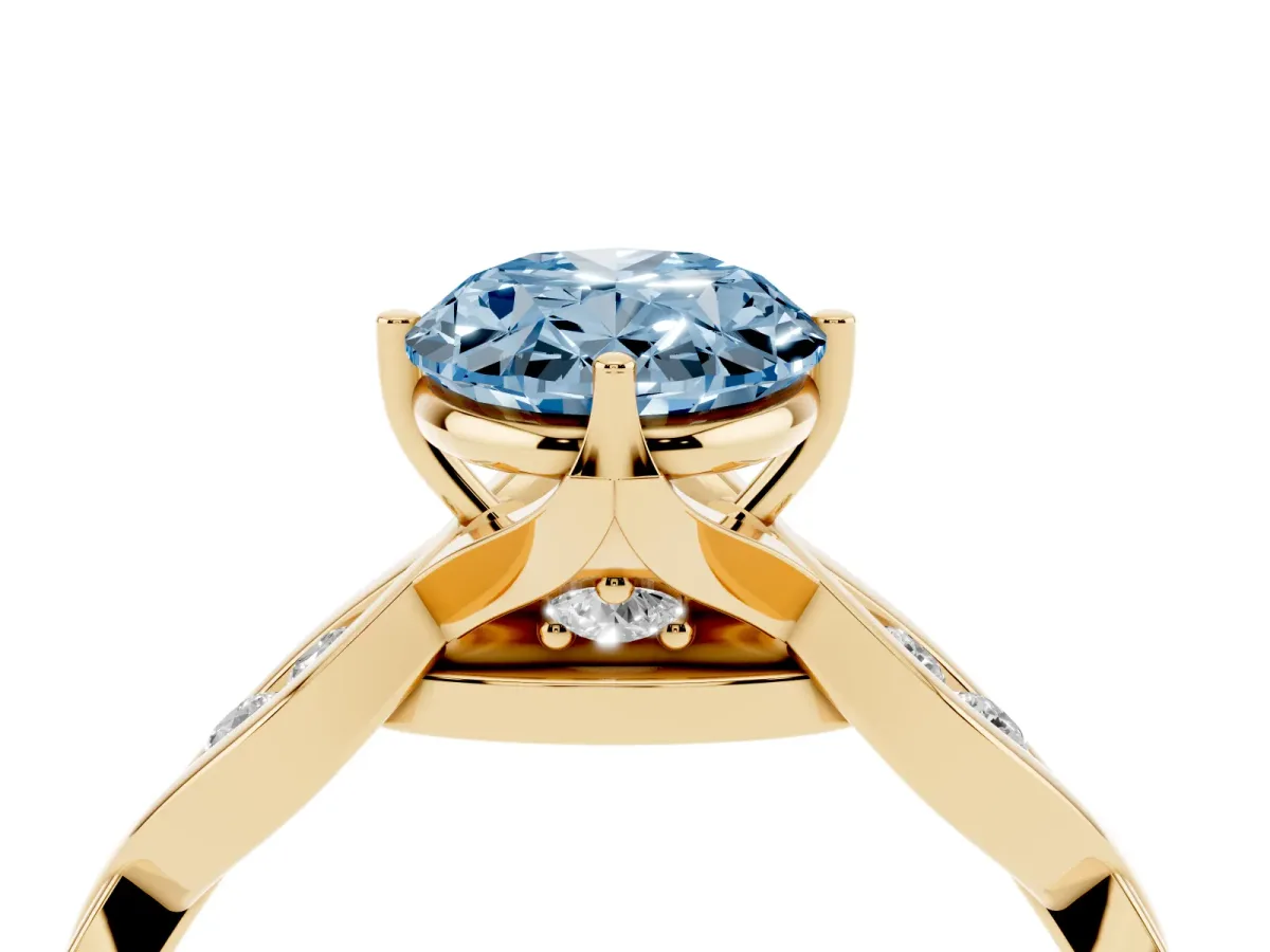 Fancy Blue Oval Cut Solitaire Twist Band with Leaf Prong Setting Yellow gold