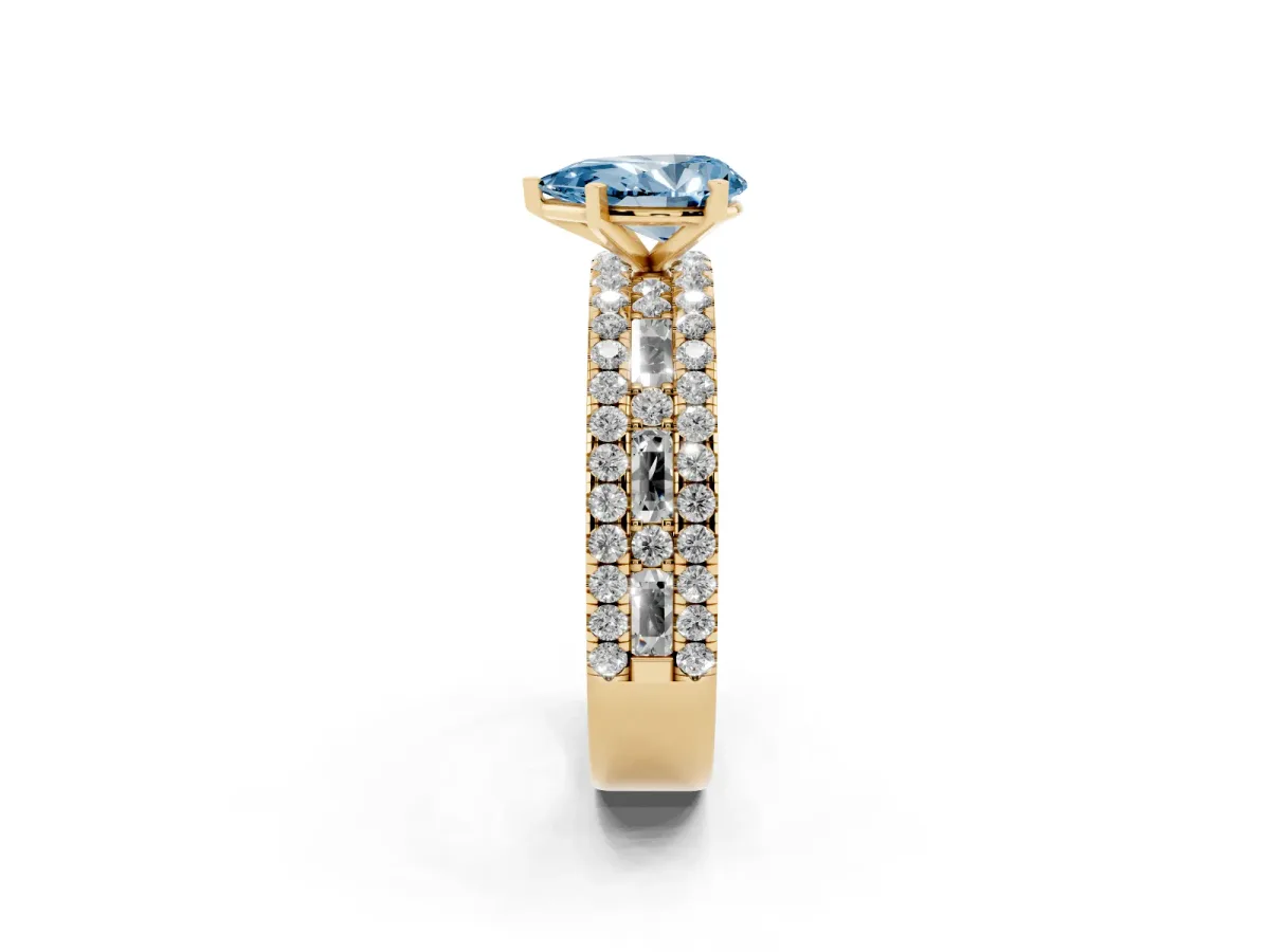 Fancy Blue Pear Cut Diamond Solitaire Ring with Pavé and Channel Set Band Yellow gold