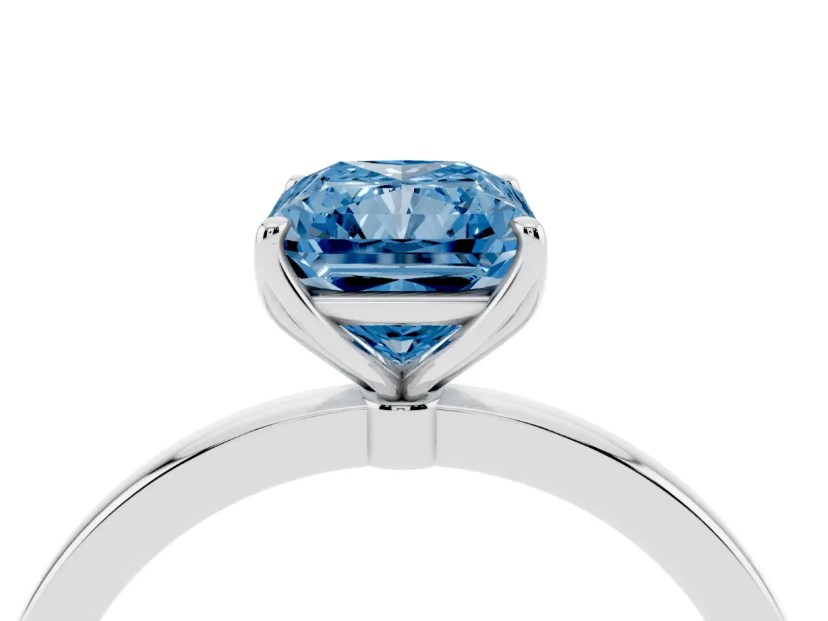 Fancy Blue Radiant Cut Diamond Solitaire Ring with Thin Band and Prong Setting White gold