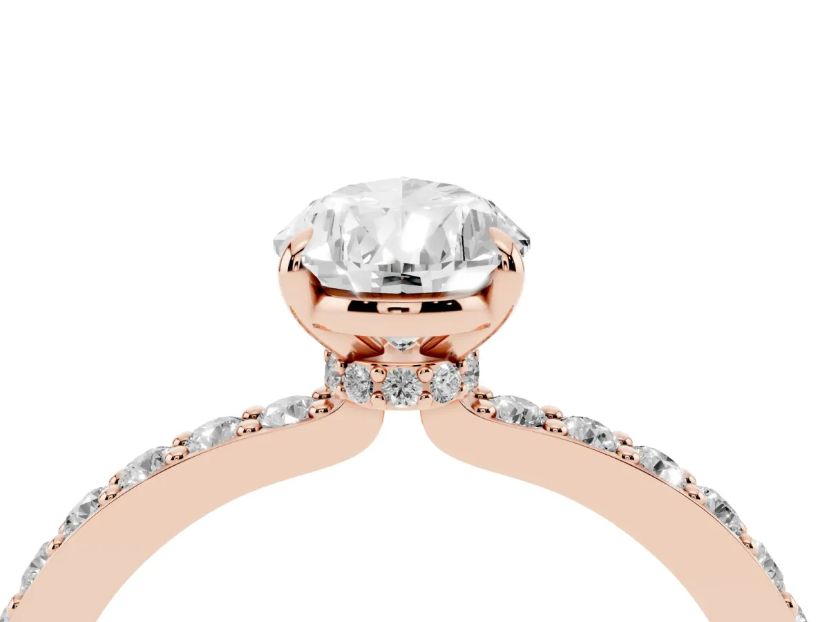 Pear Cut Diamond Pavé Engagement Ring with Round Accents and Prong Setting Rose gold