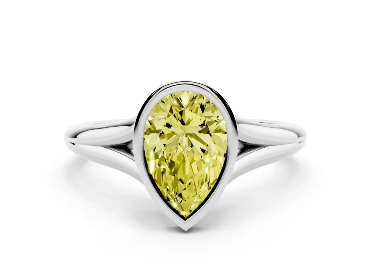 Fancy Yellow Bezel Set Pear Cut Cut Solitaire Ring with Tapered Band Silver