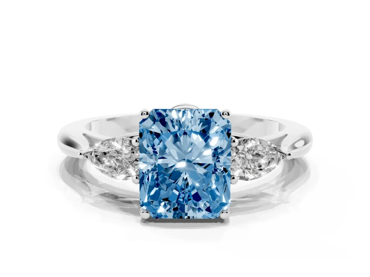 Fancy Blue Three-Stone Radiant Cut Brilliant Diamond Solitaire Ring with Tapered Band and Four-Prong Setting Platinum