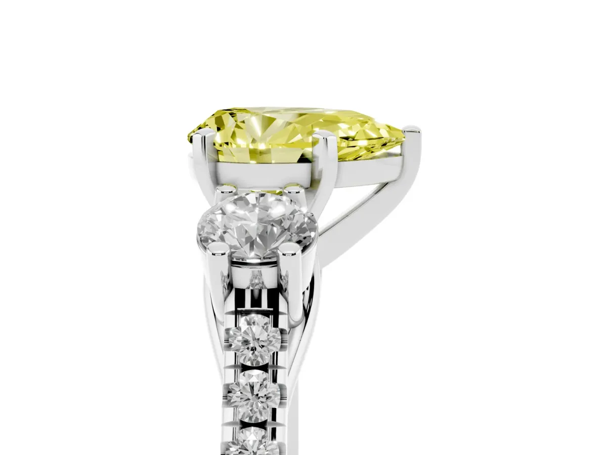 Fancy Yellow Three-Stone Pear Cut Diamond Pavé Band with Four-Prong Setting Platinum