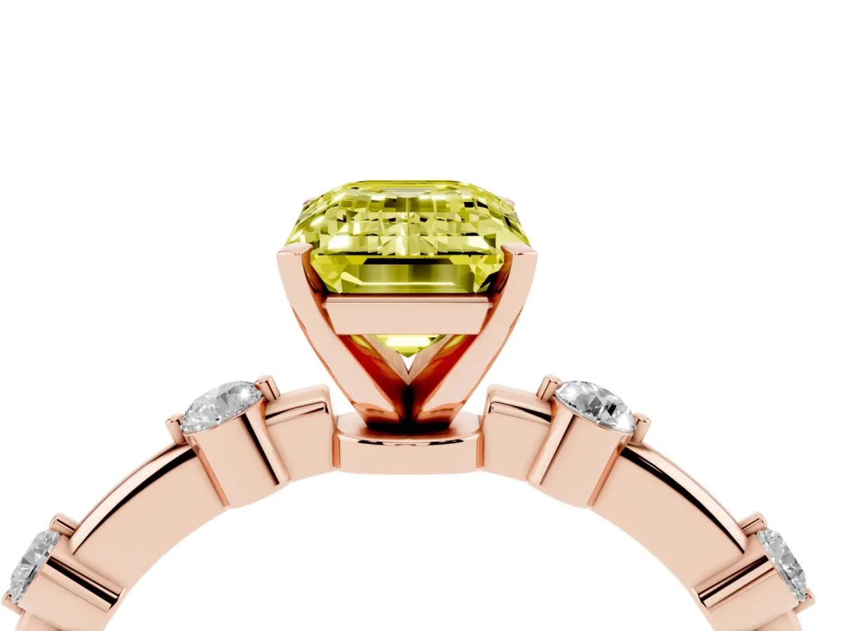 Fancy Yellow Emerald Cut Solitaire Diamond Ring with Bezel Set Side Stones and Prong Setting Rose gold