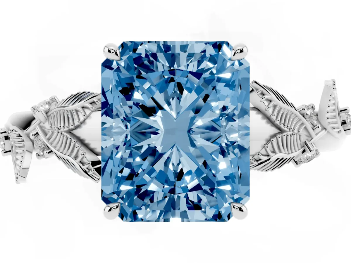 Fancy Blue Radiant Cut Diamond Solitaire Ring with Leaf Motif Band and Four-Prong Setting Silver