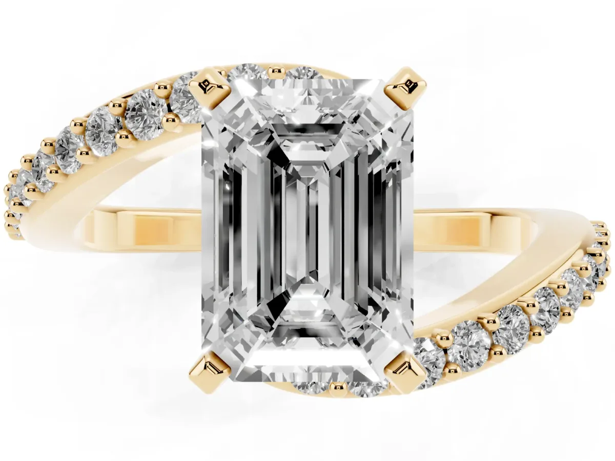 Emerald Cut Solitaire Twist Band with Pave Set Diamonds and Four-Prong Setting Yellow gold