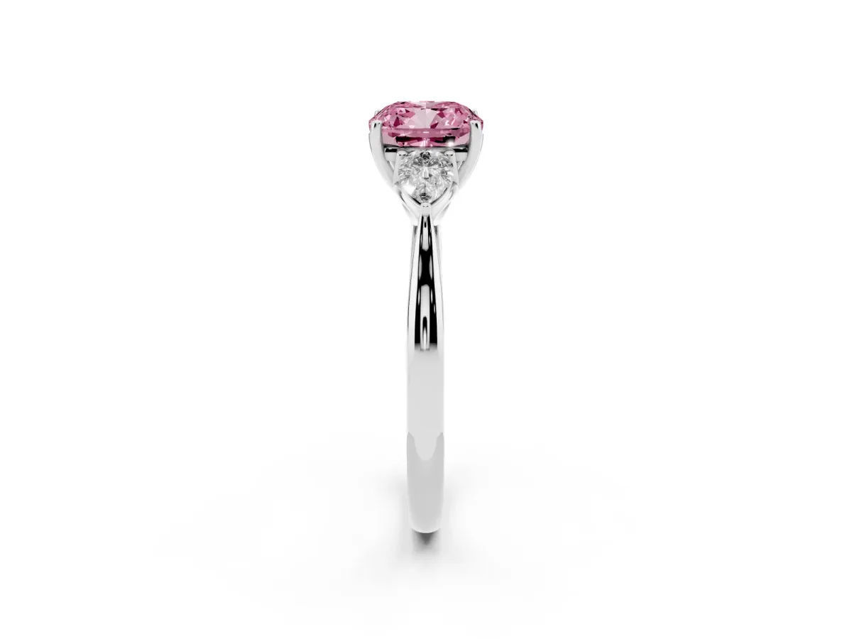 Fancy Pink Three-Stone Cushion Cut Diamond Ring with Pear Side Stones in Four-Prong Setting Platinum