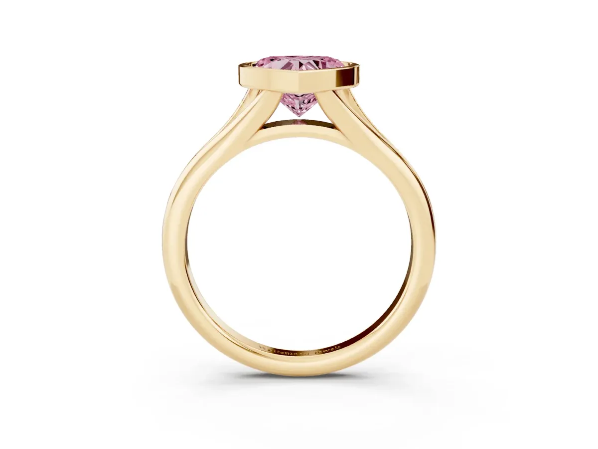 Fancy Pink Bezel Set Heart Cut Solitaire Diamond Ring with Smooth Band Yellow gold