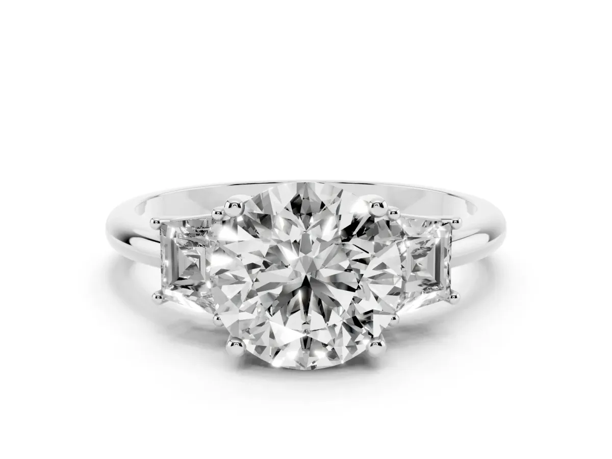 Round Cut Diamond Three-Stone Ring with Trapezoid Side Stones and Prong Setting Platinum