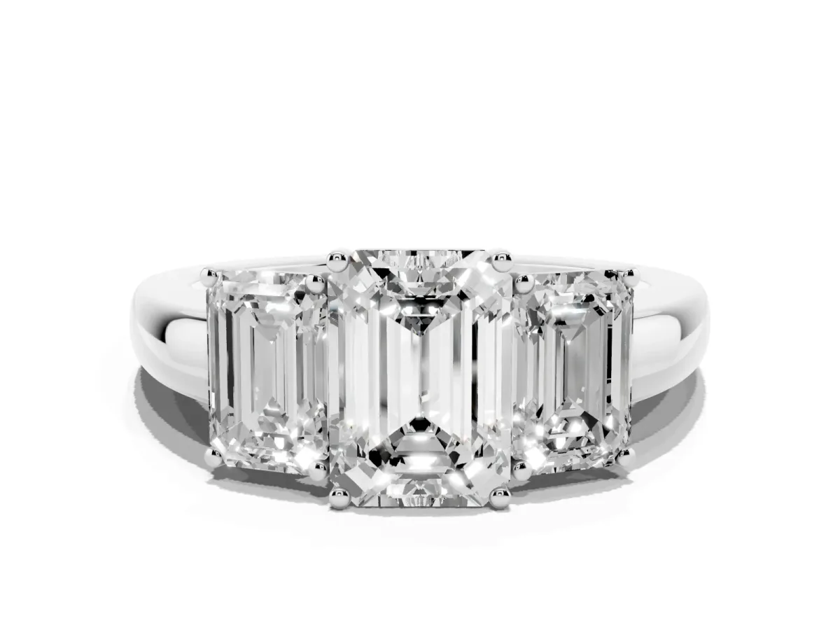 Emerald Cut Diamond Three-Stone Ring with Four-Prong Setting and Classic Band Platinum