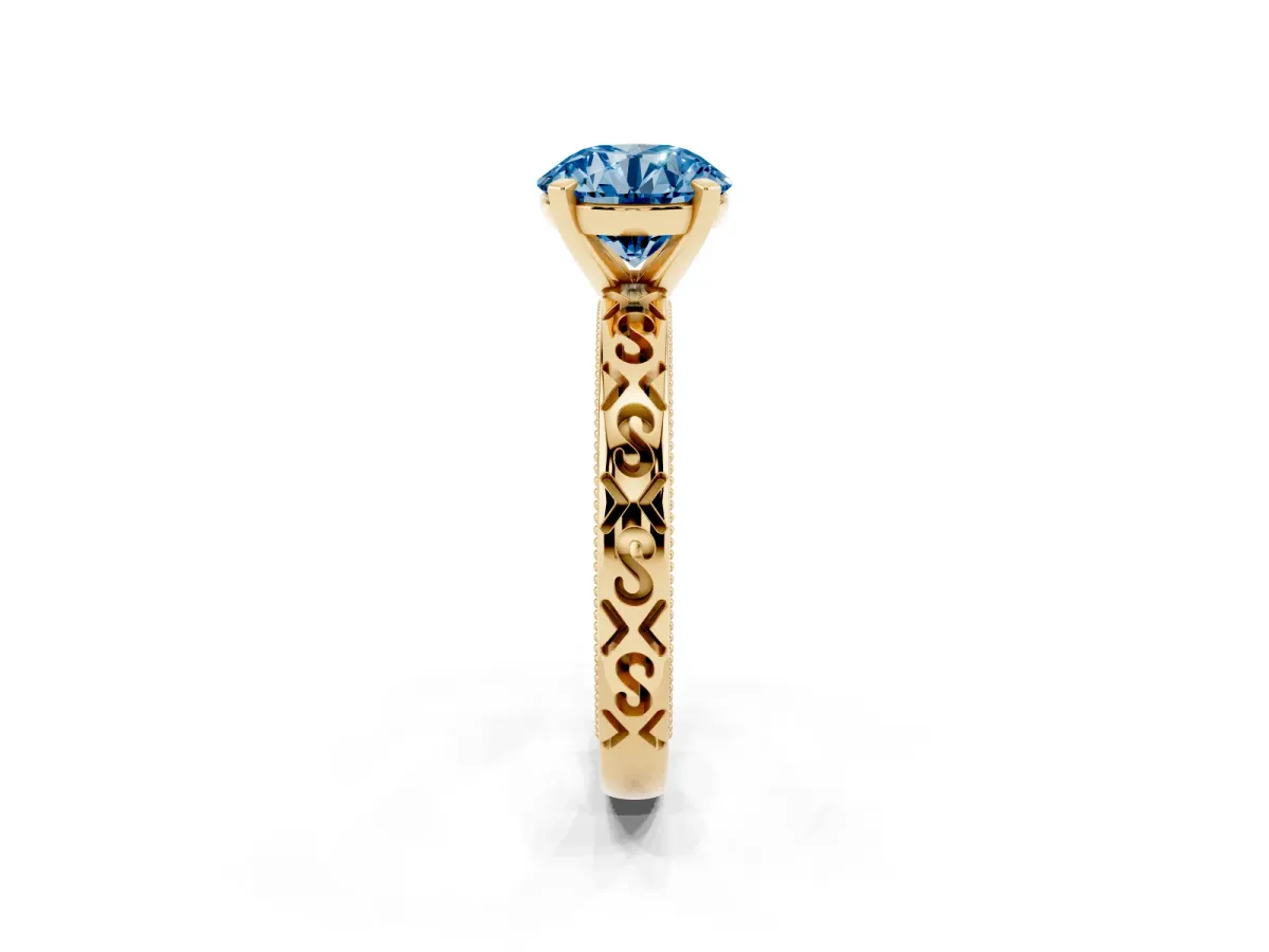 Fancy Blue Round Cut Solitaire Engagement Ring with Scrollwork Band and Four-Prong Setting Yellow gold