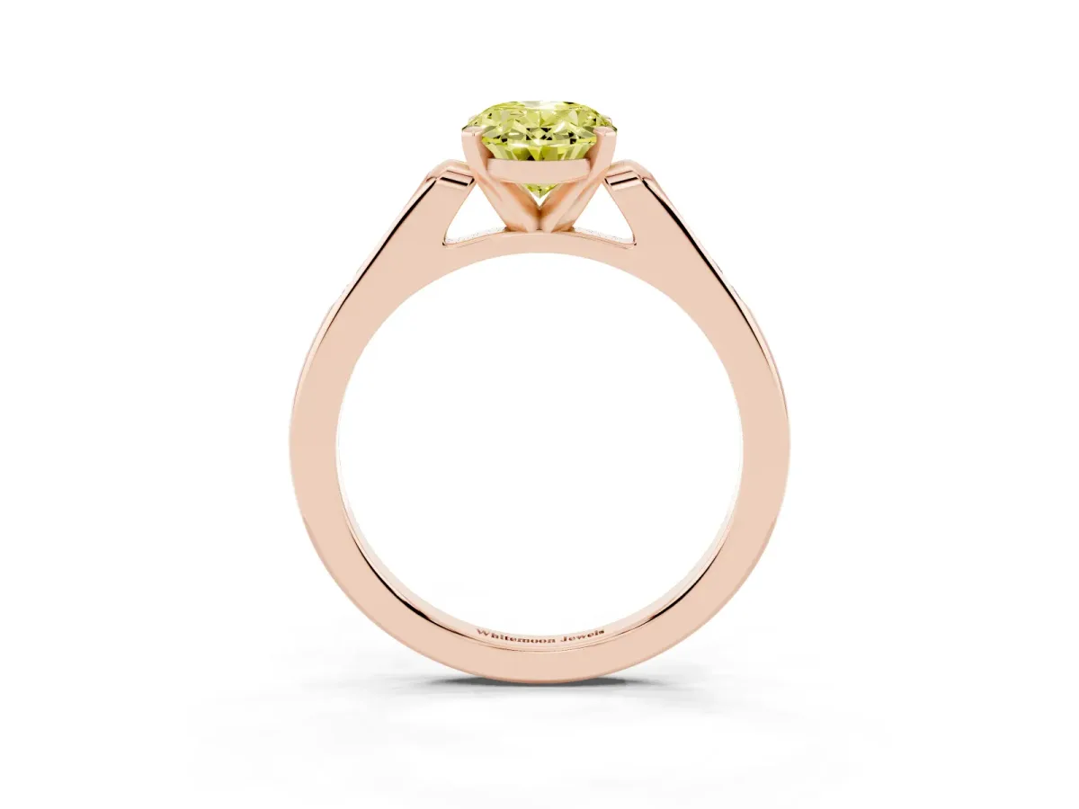 Fancy Yellow Oval Cut Diamond Solitaire Ring with Channel Set Round Band and Prong Setting Rose gold