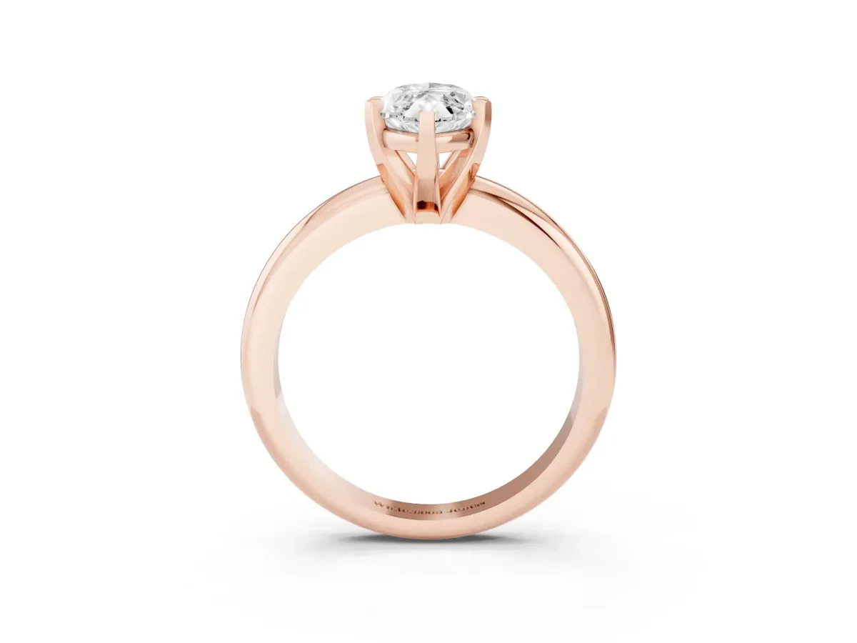 Marquise Cut Diamond Solitaire Engagement Ring with Round Band and Four-Prong Setting Rose gold