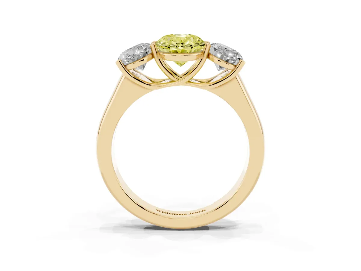 Fancy Yellow Oval Cut Three-Stone Diamond Ring with Prong Setting on a Classic Band Yellow gold