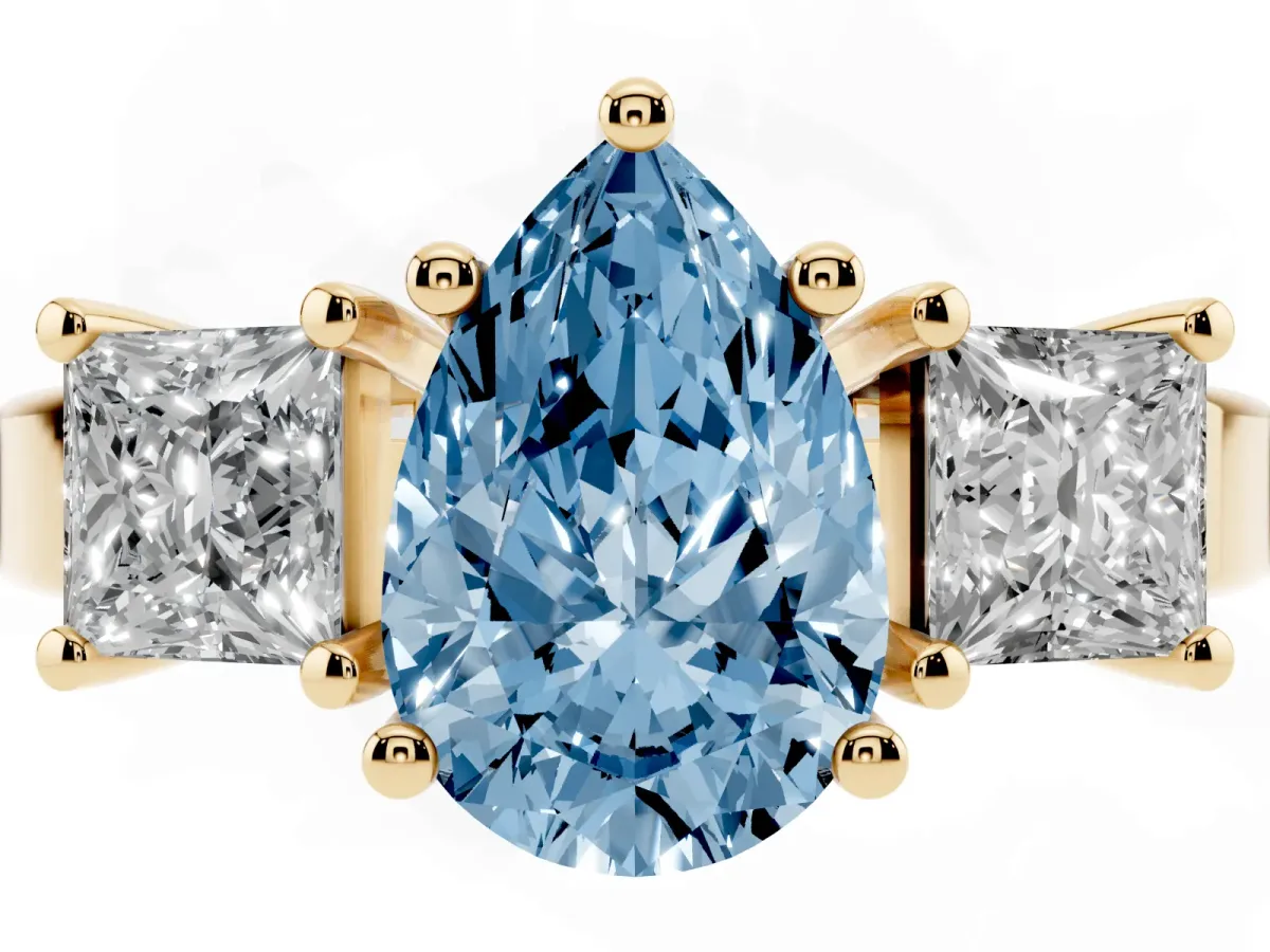 Fancy Blue Three-Stone Pear Cut Cut Solitaire Ring with Prong Setting Yellow gold