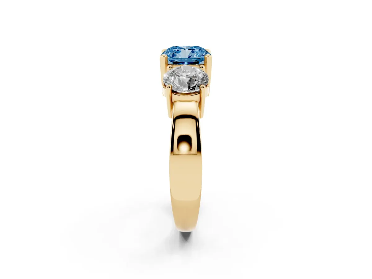 Fancy Blue Three-Stone Cushion Cut Diamond Ring with Round Side Stones, Classic Band, and Four-Prong Setting Yellow gold
