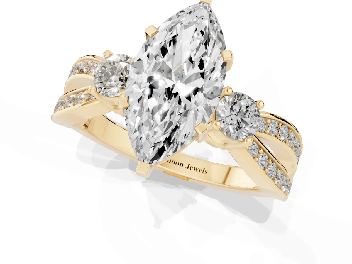 Three-Stone Marquise Cut Cut Diamond Twist Band with Prong Setting Yellow gold
