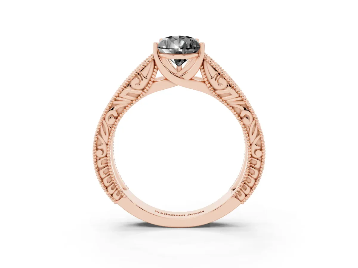 Fancy Black Pear Cut Diamond Solitaire Ring with Engraved Band and Four-Prong Setting Rose gold