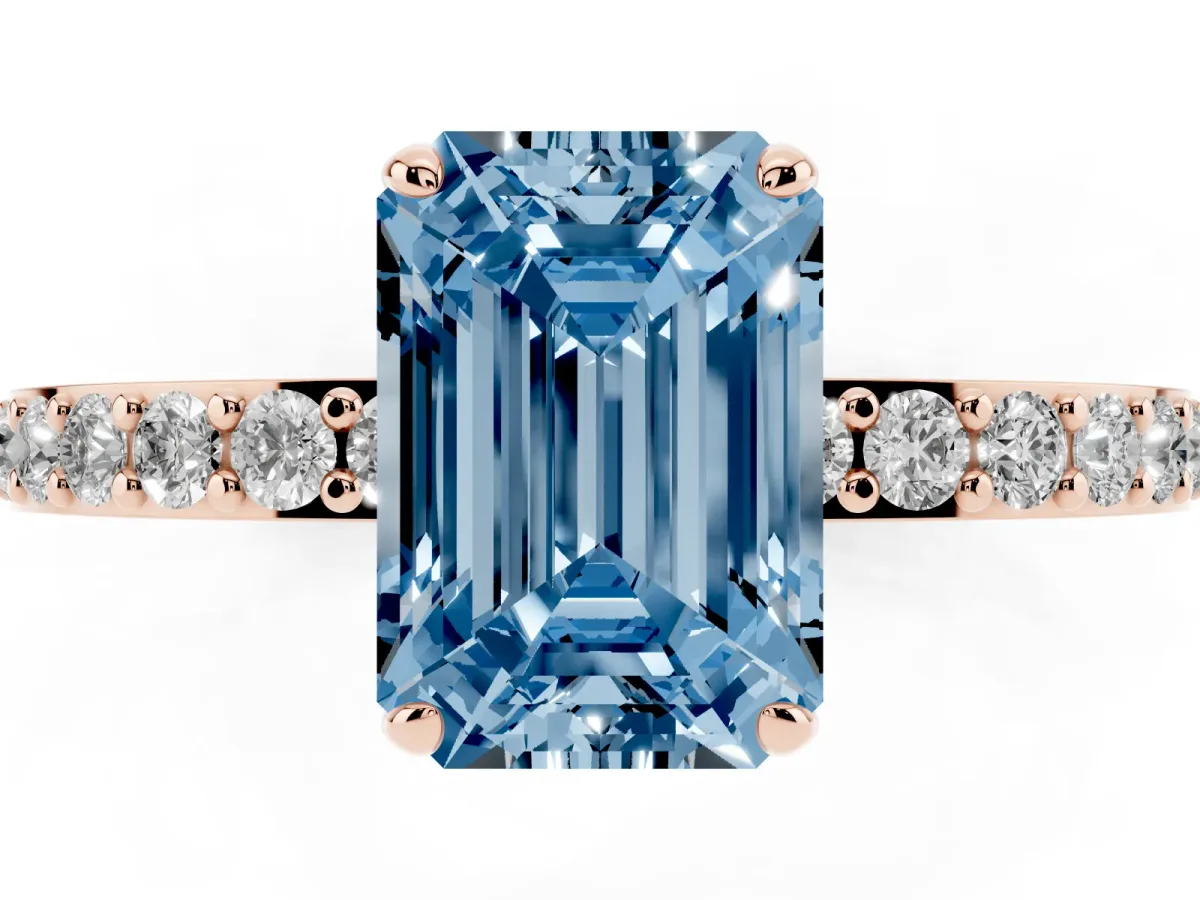 Fancy Blue Emerald Cut Diamond Pavé Engagement Ring with Round Accents and Prong Setting Rose gold