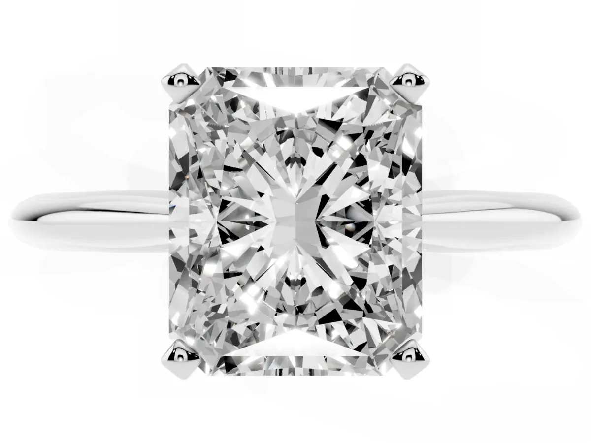 Radiant Cut Cut Solitaire Ring with Four-Prong Setting on a Classic Band Platinum