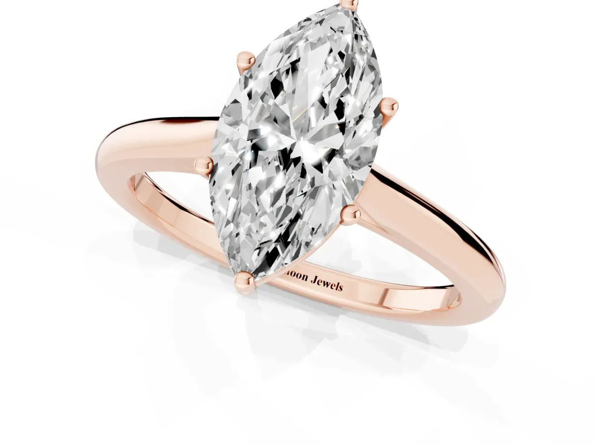 Marquise Cut Cut Solitaire Ring with Cathedral Band and Four-Prong Setting Rose gold