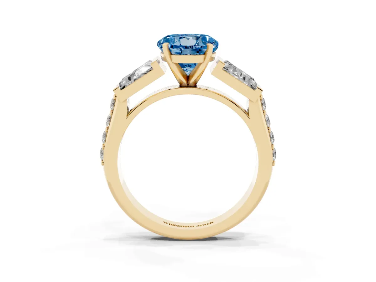 Fancy Blue Round Cut Diamond Engagement Ring with Baguette Side Stones and Channel Set Band Yellow gold
