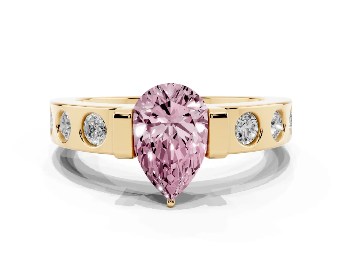 Fancy Pink Pear Cut Brilliant Channel-Set Diamond Ring with Bezel Prong Setting Yellow gold