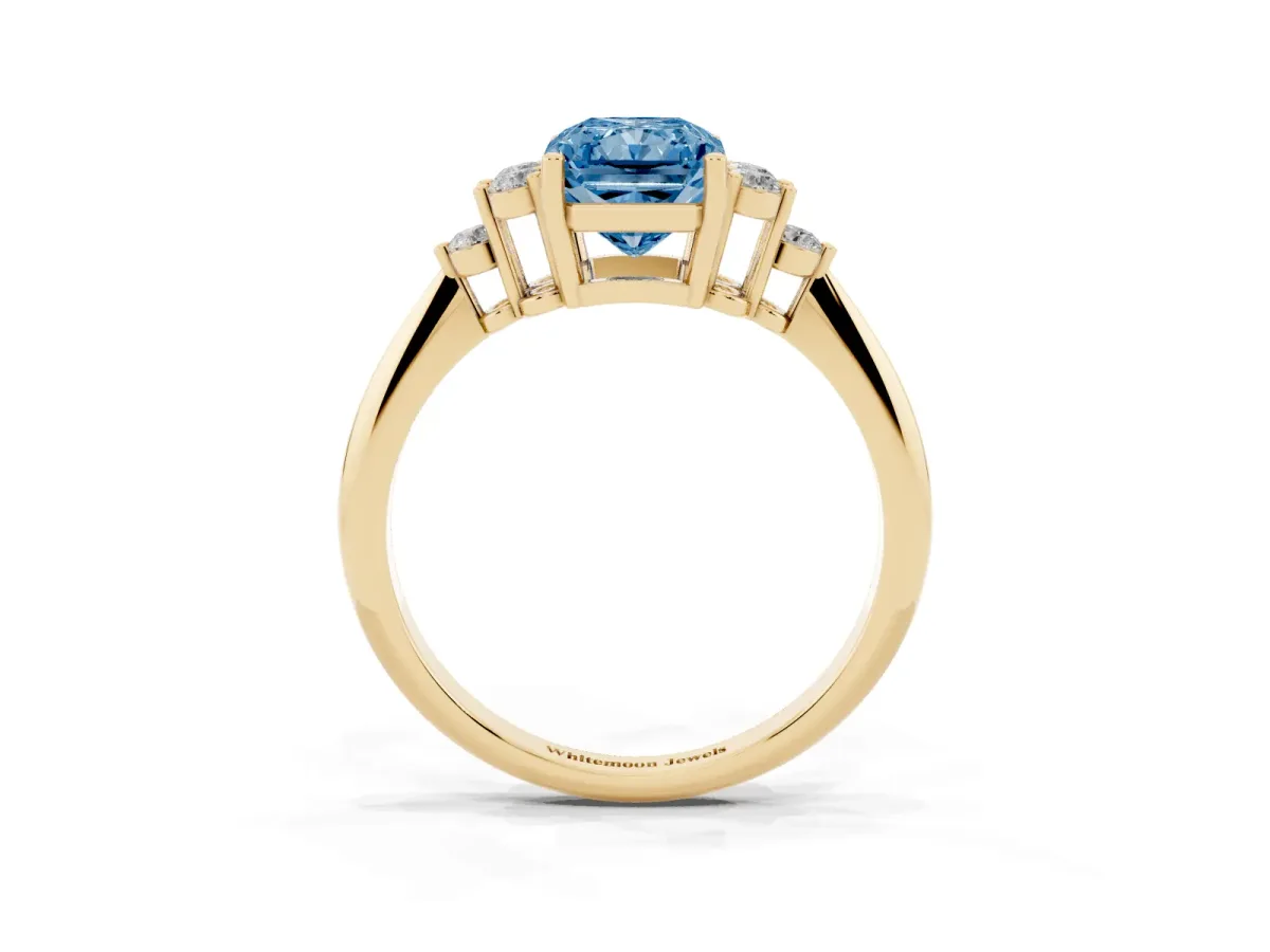 Fancy Blue Radiant Cut Cut Diamond Cluster Ring with Solitaire Band and Four-Prong Setting Yellow gold