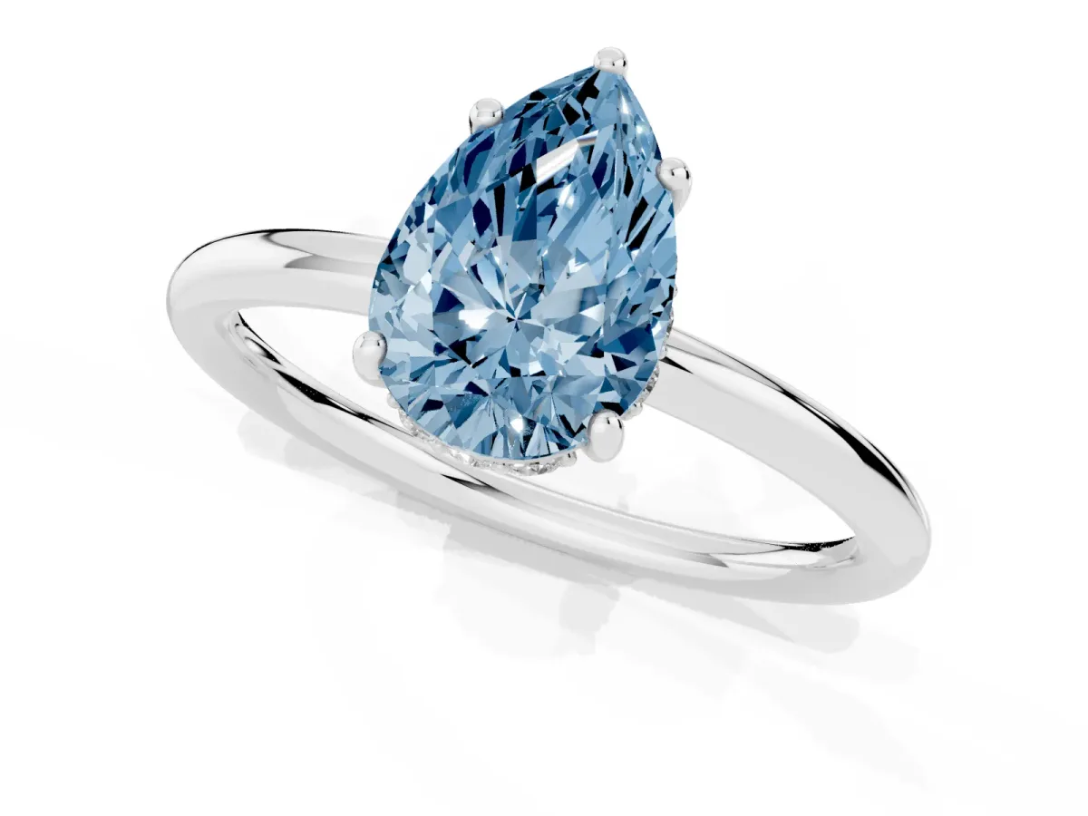 Fancy Blue Pear Cut Solitaire Diamond Ring with a Classic Band and Four-Prong Setting Platinum