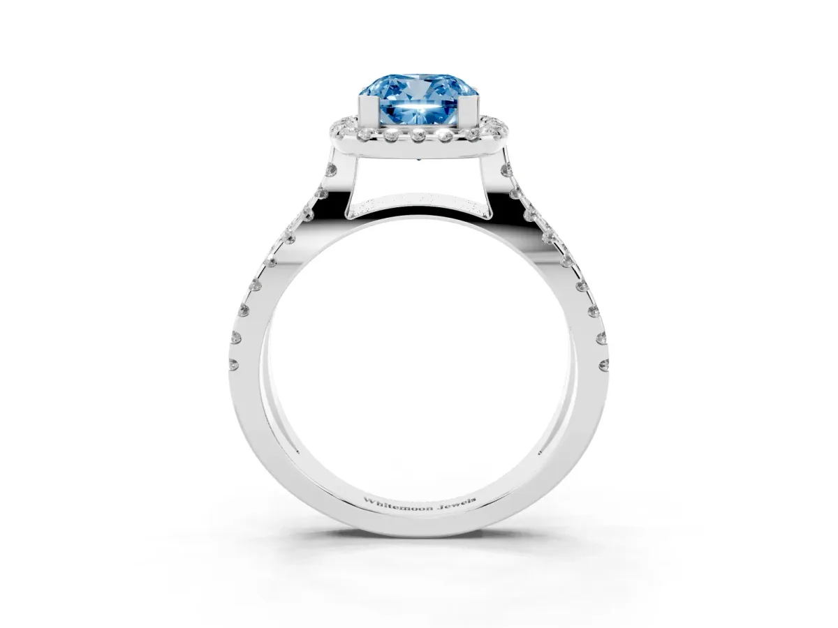 Fancy Blue Cushion Cut Diamond Halo Ring with Split Shank Pavé Band and Prong Setting Silver
