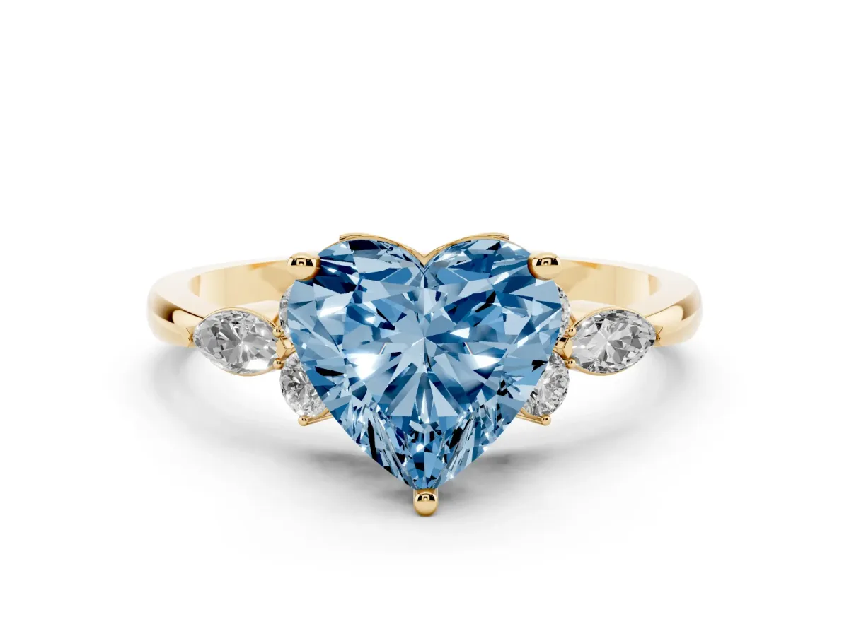 Fancy Blue Heart Cut Brilliant Diamond Solitaire Ring with Pear Side Stones and Four-Prong Setting Yellow gold