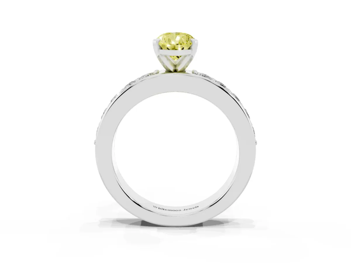 Fancy Yellow Pear Cut Diamond Engagement Ring with Channel Set Round Band and Prong Setting Silver