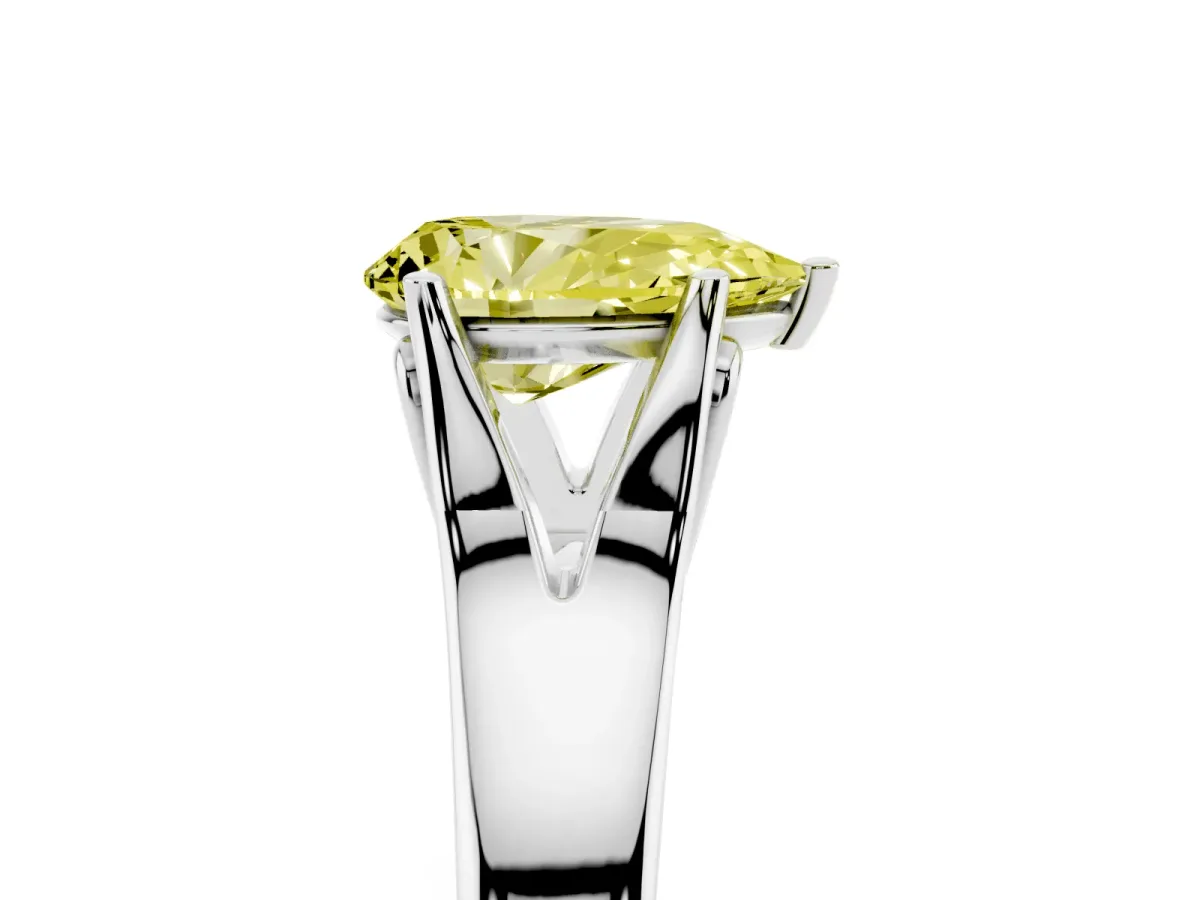 Fancy Yellow Pear Cut Solitaire Diamond Ring with Cathedral Band and Four-Prong Setting Silver