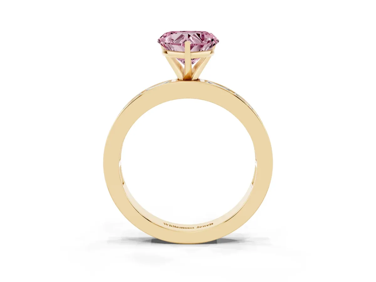 Fancy Pink Heart Cut Solitaire Diamond Ring with Channel-Set Baguette Band and Four-Prong Setting Yellow gold