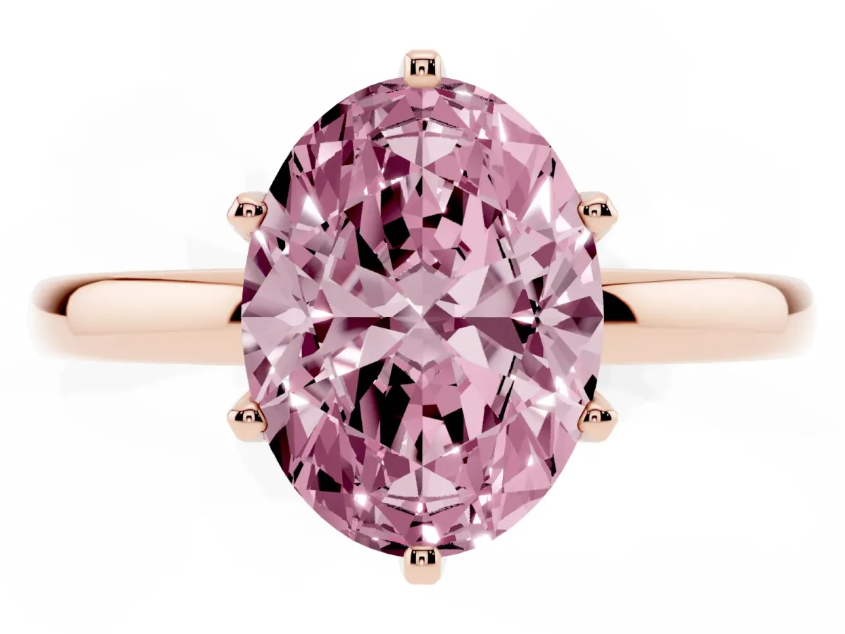 Fancy Pink Oval Cut Solitaire Diamond Ring with Six-Prong Setting on a Classic Band Rose gold