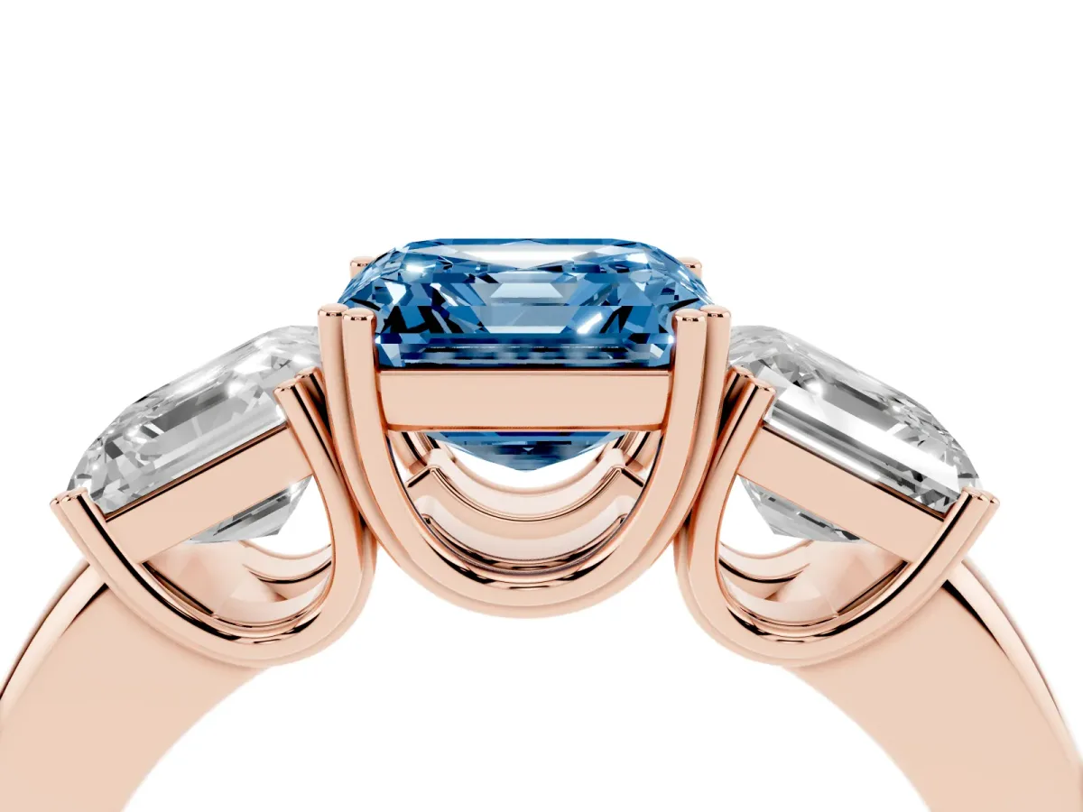 Fancy Blue Three-Stone Asscher Cut Cut Diamond Ring with Channel Set Band and Four-Prong Setting Rose gold